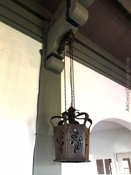 Near-replica Spanish Revival lanterns.