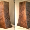 Beaten copper island hood with repoussé by Archive Designs